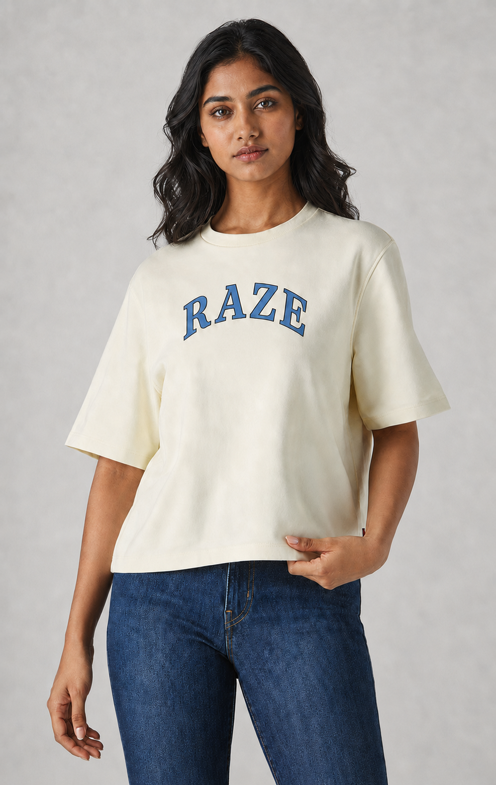 Indian model wearing RAZE collegiate cream oversized T-shirt