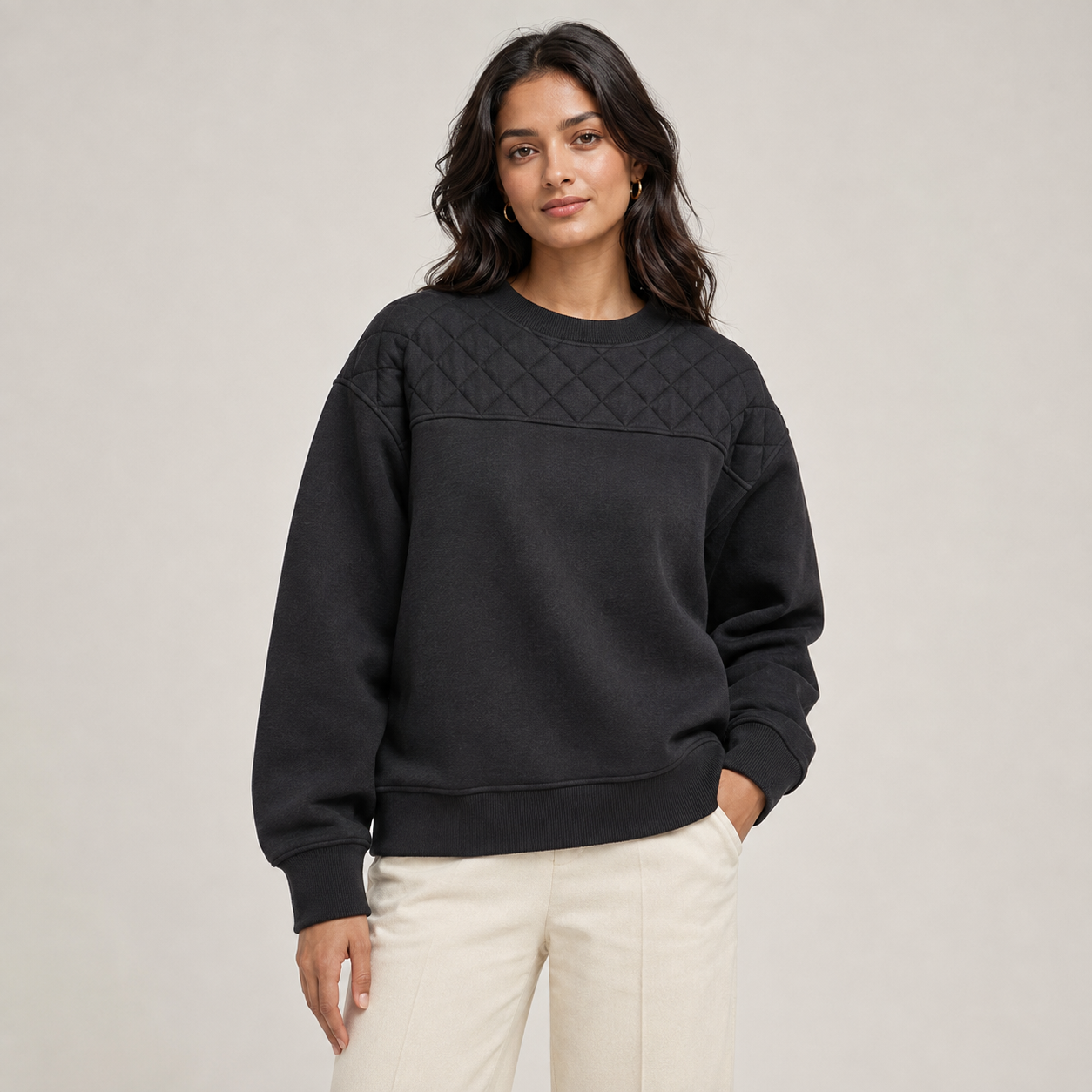 Women's premium charcoal black quilted-yoke sweatshirt front view