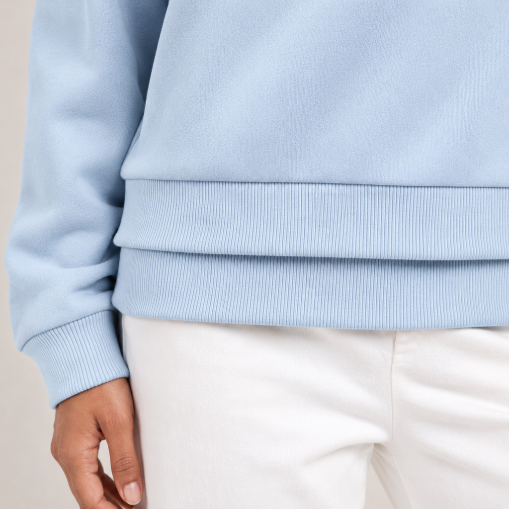 Ice blue sweatshirt double-layer ribbed hem construction detail